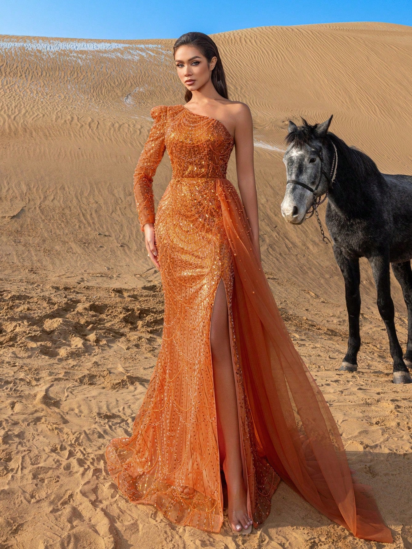 Elegant One-Shoulder Beaded Evening Gown with Dramatic Long Sleeves, Back-Bow Accent, High-Thigh Slit & Cascading Side Panel Mermaid Dress