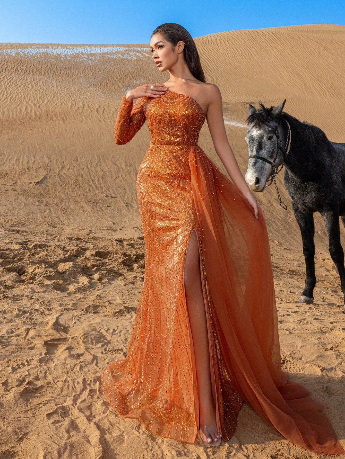 Elegant One-Shoulder Beaded Evening Gown with Dramatic Long Sleeves, Back-Bow Accent, High-Thigh Slit & Cascading Side Panel Mermaid Dress