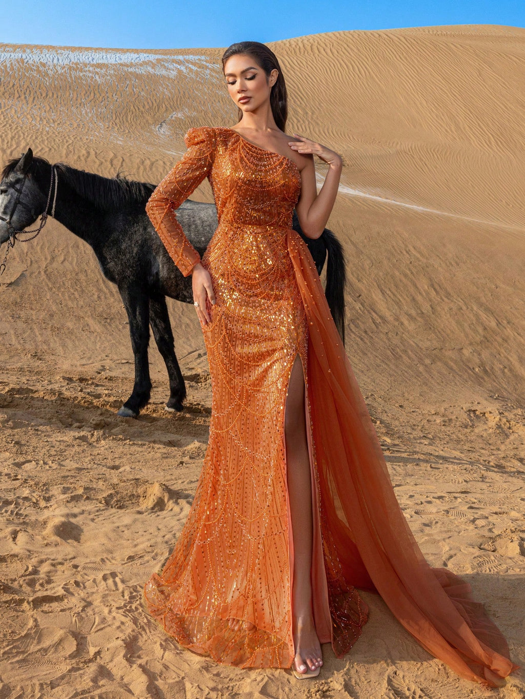 Elegant One-Shoulder Beaded Evening Gown with Dramatic Long Sleeves, Back-Bow Accent, High-Thigh Slit & Cascading Side Panel Mermaid Dress
