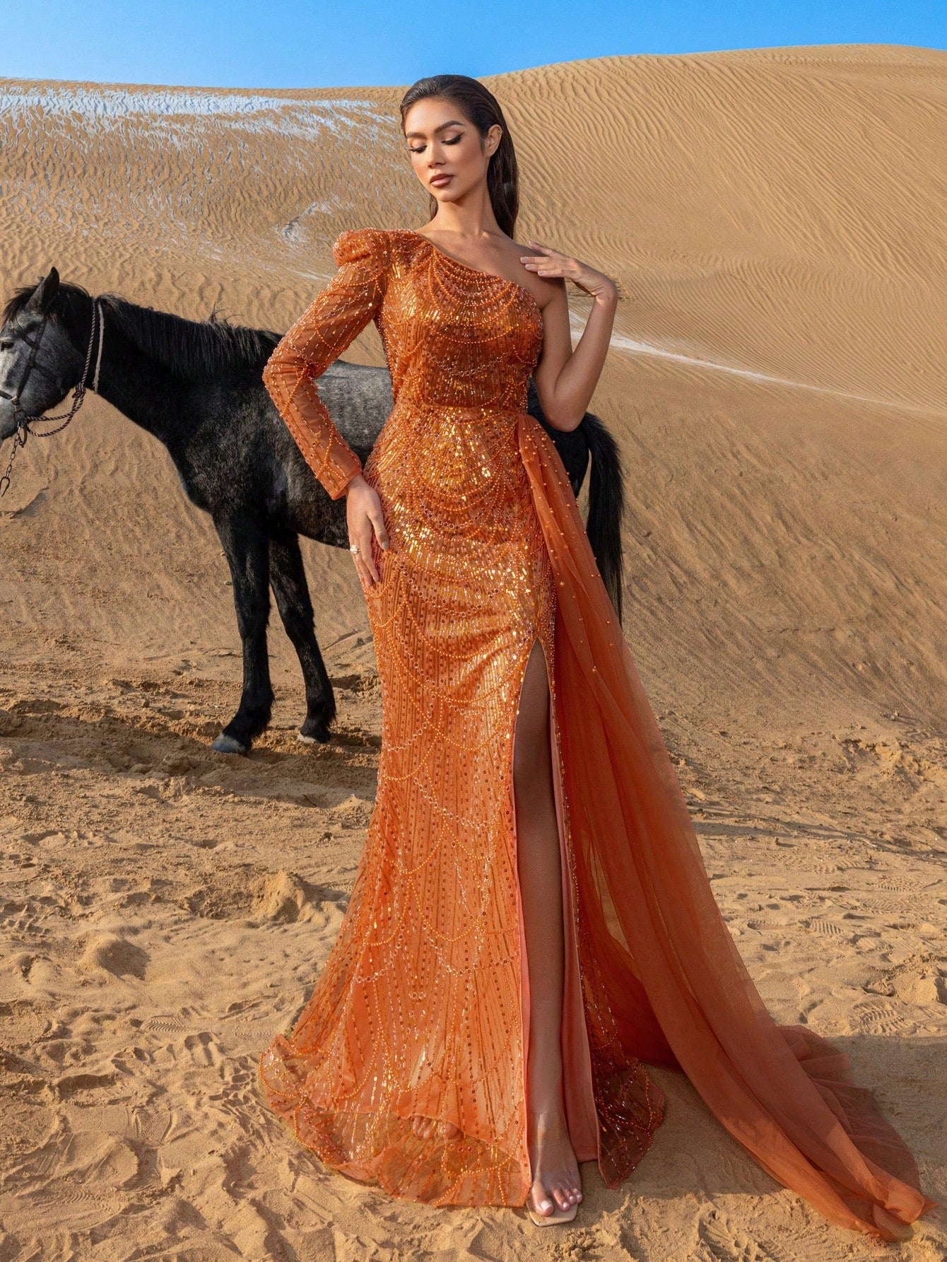 Elegant One-Shoulder Beaded Evening Gown with Dramatic Long Sleeves, Back-Bow Accent, High-Thigh Slit & Cascading Side Panel Mermaid Dress